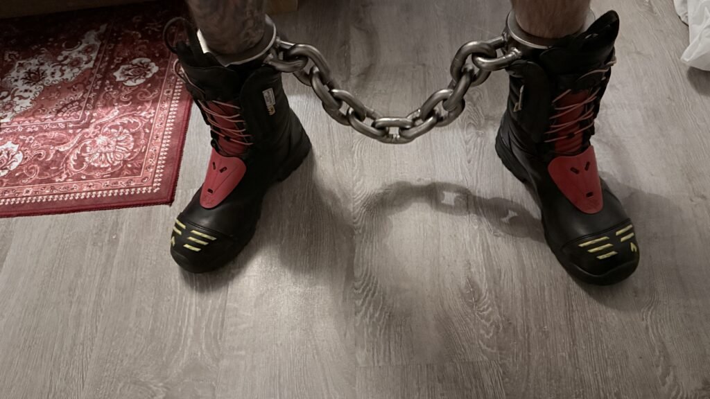 Author wearing haix fire boots with heavy parus leg irons.