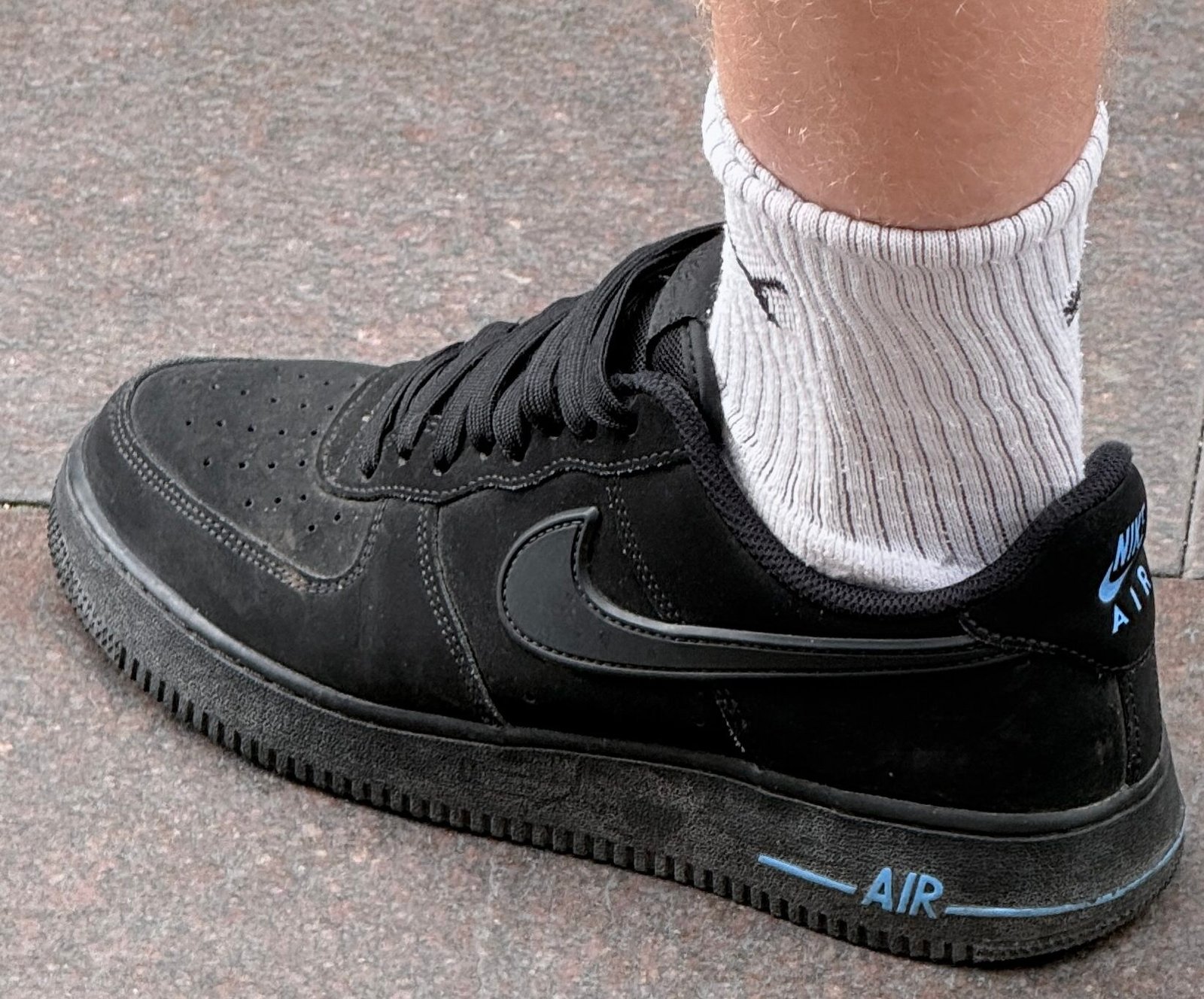 Black nike af1 low tops blue letters.